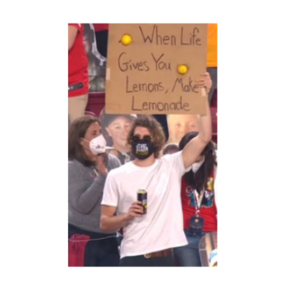 Super Bowl Ads Shows Guy With a Sign