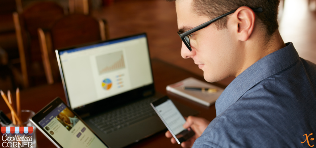 Man looking at different devices