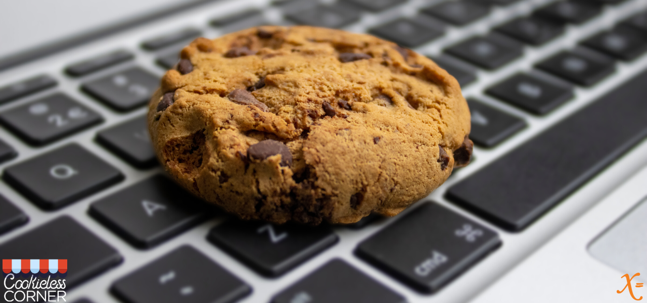 chocolate chip cookie resting on a keyboard