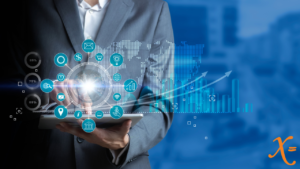 Marketer analyzing e-commerce data using graphs with a tablet to prepare for the future of digital marketing
